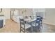 Bright dining area features a table with seating for six, and a view of the stainless steel kitchen appliances at 325 Coral Sunset Way, Summerville, SC 29486
