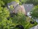 Aerial view of a well-maintained brick home with mature landscaping on a sunny day at 3385 Wayland Dr, Ladson, SC 29456