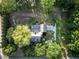 Overhead view of a brick home with mature trees and landscaping on a sunny day at 3385 Wayland Dr, Ladson, SC 29456