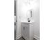 Bathroom features white vanity with a black faucet, a mirror and modern lighting at 3385 Wayland Dr, Ladson, SC 29456