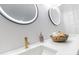 Bathroom showcasing modern sinks and fixtures, stylish tile and decorative accents at 3385 Wayland Dr, Ladson, SC 29456