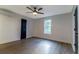 Bedroom features hardwood floors, a ceiling fan, a window, and a modern, wall-mounted air conditioner at 3385 Wayland Dr, Ladson, SC 29456