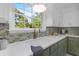 Kitchen featuring a stainless steel sink, granite countertops, and natural lighting at 3385 Wayland Dr, Ladson, SC 29456