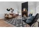 Inviting living room features a fireplace with a black accent wall and stylish decor at 3385 Wayland Dr, Ladson, SC 29456