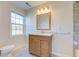 Updated bathroom features marble vanity, updated fixture, and ample light from window to the left at 3627 Marginal Rd, Mount Pleasant, SC 29466