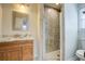 Updated bathroom features marble vanity, glass shower, and modern fixtures for a spa-like experience at 3627 Marginal Rd, Mount Pleasant, SC 29466