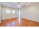 Bedroom with hardwood floors and natural light from the multiple windows at 3627 Marginal Rd, Mount Pleasant, SC 29466