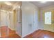 Hallway featuring hardwood floors and classic doors and trim at 3627 Marginal Rd, Mount Pleasant, SC 29466