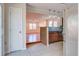 Open concept kitchen with granite breakfast bar, stainless steel appliances, tile flooring, and access to the living area at 3627 Marginal Rd, Mount Pleasant, SC 29466
