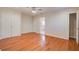 Spacious main bedroom with hardwood floors, ceiling fan, and ensuite bathroom at 3627 Marginal Rd, Mount Pleasant, SC 29466