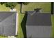 This aerial view shows the backyard, fence, and roof of the house at 3806 Sourwood Ct, Ladson, SC 29456