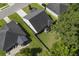 This aerial view highlights the properties' backyard gazebo, roof and fence at 3806 Sourwood Ct, Ladson, SC 29456