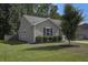 This home features manicured landscaping and a well-maintained lawn at 3806 Sourwood Ct, Ladson, SC 29456