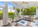 Covered outdoor porch with an outdoor table, chairs, and a modern fire pit at 3870 Fifle St, Mount Pleasant, SC 29466