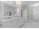 Well-lit bathroom showcasing a large mirror, a vanity and walk-in shower at 3870 Fifle St, Mount Pleasant, SC 29466