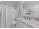 Clean bathroom with granite countertop vanity, shower and bath combination, and modern finishes at 3870 Fifle St, Mount Pleasant, SC 29466