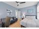 Cozy bedroom with blue walls, a comfortable bed, and modern decor, creating a relaxing retreat at 3870 Fifle St, Mount Pleasant, SC 29466