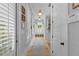 Bright hallway with natural light, window seating, and hardwood floors, offering warm ambiance at 3870 Fifle St, Mount Pleasant, SC 29466