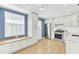 Modern kitchen features stainless steel appliances, lots of bright cabinetry, and a breakfast nook at 4756 Churchill Rd, North Charleston, SC 29405