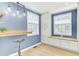 Bright kitchenette with a breakfast bar, three windows, and plenty of cabinet space at 4756 Churchill Rd, North Charleston, SC 29405