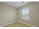 Spacious walk-in closet with wire shelving, offering ample storage space and natural light from the window at 4949 Serene Ln, Hollywood, SC 29449