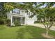 Beautiful two-story home with a well-kept lawn, charming front porch, and convenient two-car garage at 4949 Serene Ln, Hollywood, SC 29449