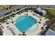 Aerial view of a large community pool with lounge chairs and umbrellas at 5305 Bending Flats Way, Summerville, SC 29485