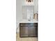 Cozy bathroom featuring classic fixtures, a functional vanity, and neutral tones at 613 Ravens Wood Rd, Summerville, SC 29486
