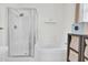 Bathroom with a soaking tub, glass enclosed shower, and wood floors at 613 Ravens Wood Rd, Summerville, SC 29486