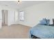 Bright bedroom featuring neutral carpet, offering a serene and minimalist retreat at 613 Ravens Wood Rd, Summerville, SC 29486