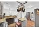 Bright kitchen with granite countertops, wooden floors, and stainless steel appliances at 613 Ravens Wood Rd, Summerville, SC 29486