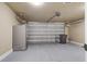 Spacious garage interior with a refrigerator, ample storage space, and overhead lighting at 656 Coleman Blvd # 402, Mount Pleasant, SC 29464