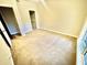 Empty carpeted bedroom featuring neutral paint, window, and closet at 700 Daniel Ellis Dr # 2203, Charleston, SC 29412