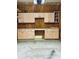 Spacious garage interior with built-in cabinets providing ample storage at 700 Daniel Ellis Dr # 2203, Charleston, SC 29412