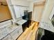 Well-lit kitchen with stainless sink, granite countertops, white cabinetry, and modern appliances at 700 Daniel Ellis Dr # 2203, Charleston, SC 29412