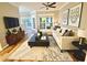 Bright and stylish living room with modern decor, hardwood floors, and comfortable seating at 700 Daniel Ellis Dr # 2203, Charleston, SC 29412
