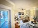 Comfortable living room with plush seating, a ceiling fan, and plenty of natural light at 700 Daniel Ellis Dr # 2203, Charleston, SC 29412