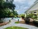Enjoy the community pool, surrounded by lush landscaping and comfortable lounge chairs at 700 Daniel Ellis Dr # 2203, Charleston, SC 29412