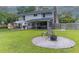 The expansive backyard features a fire pit, outdoor seating and plenty of room to enjoy at 806 Westos Way, Mount Pleasant, SC 29464