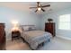 Cozy bedroom featuring neutral paint, ceiling fan, and wood dresser at 806 Westos Way, Mount Pleasant, SC 29464