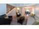 Comfortable living room boasts an open floor plan with hardwood floors, a staircase, and cozy furniture at 806 Westos Way, Mount Pleasant, SC 29464