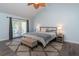 Serene primary bedroom with vaulted ceilings, plush carpet, and ensuite bathroom access at 806 Westos Way, Mount Pleasant, SC 29464