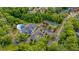 Birds eye view of community amenities including a pool, tennis courts, and clubhouse at 9117 Woodcreek Ct, North Charleston, SC 29406