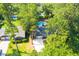Aerial shot of a home nestled among trees, showcasing the property and pool at 109 Garbon Dr, Summerville, SC 29485