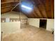 Bright attic area with open beam ceiling, and unfinished walls showing storage potential at 109 Garbon Dr, Summerville, SC 29485