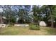 Backyard with a small in-ground pool, a garden and wooden shed at 109 Garbon Dr, Summerville, SC 29485