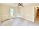 Bright bedroom with a large window, closet and ceiling fan, offering comfortable living space at 109 Garbon Dr, Summerville, SC 29485