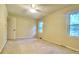Bedroom with carpet, ceiling fan, and two windows at 109 Garbon Dr, Summerville, SC 29485