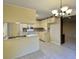 Functional kitchen with updated appliances and mosaic backsplash, open to a dining area at 109 Garbon Dr, Summerville, SC 29485
