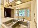 Kitchen sink view with a window overlooking the outdoors and an open-concept layout at 109 Garbon Dr, Summerville, SC 29485